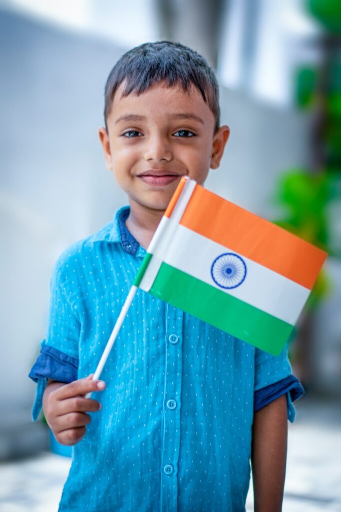boy holding India flag